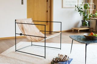 Casperünd opknoping lederen fauteuil