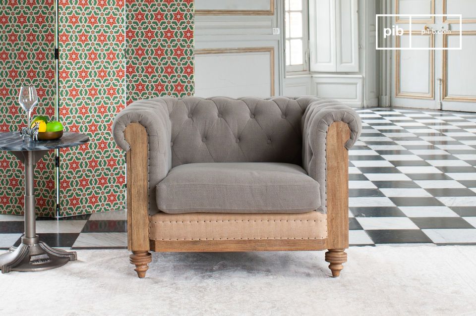 Een fauteuil met een grijze vintage stijl, opnieuw bekeken op een moderne manier