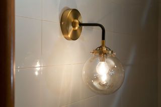 Halsa gouden wandlamp