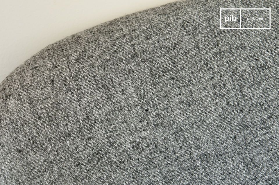 Lichtgrijze stof met een licht gevlekte tweed look.